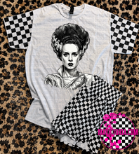 Load image into Gallery viewer, Horror collection graphic tee with checkered print sleeve
