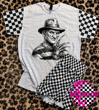 Load image into Gallery viewer, Horror collection graphic tee with checkered print sleeve
