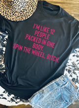 Load image into Gallery viewer, I’m like 12 people packed in one body. Spin the wheel bitch. on black with TEAL or hot pink letters hoodie, crewneck, long sleeve or graphic tee - Mavictoria Designs Hot Press Express
