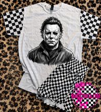 Load image into Gallery viewer, Horror collection graphic tee with checkered print sleeve
