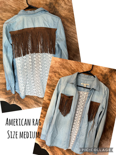 American Rag size medium denim button up with a lace and suede fringe back and on front pockets with poker charms and feather accents. ONE OF A KIND - Mavictoria Designs Hot Press Express