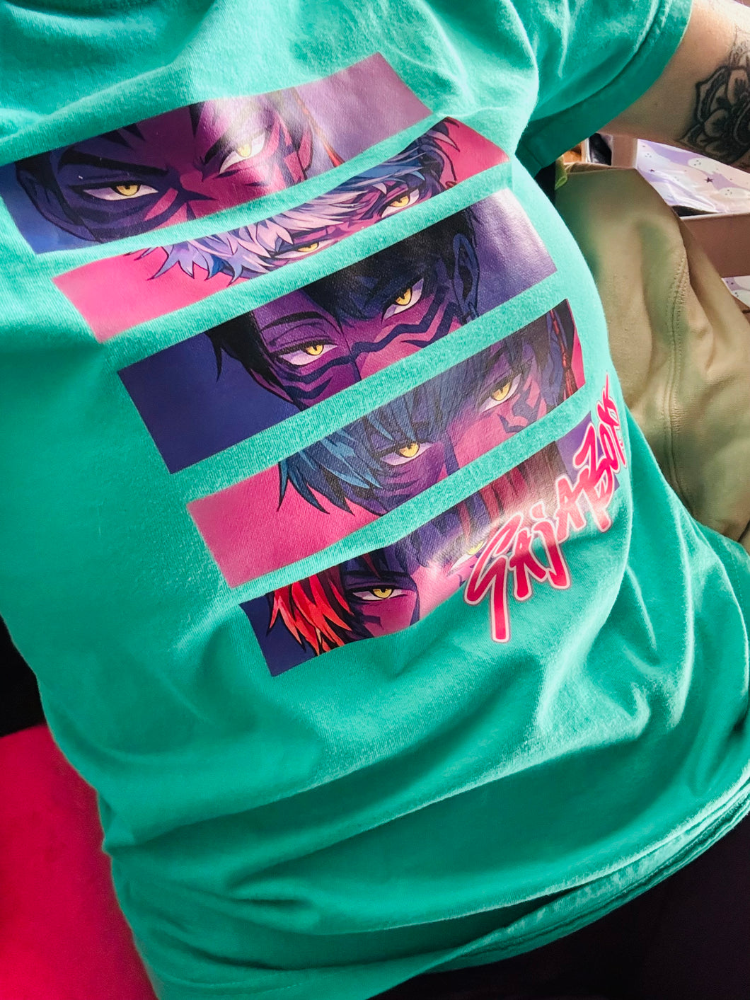 Saja boys K-pop demon hunters on island green graphic tee - Mavictoria Designs Hot Press Express
