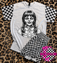 Load image into Gallery viewer, Horror collection graphic tee with checkered print sleeve

