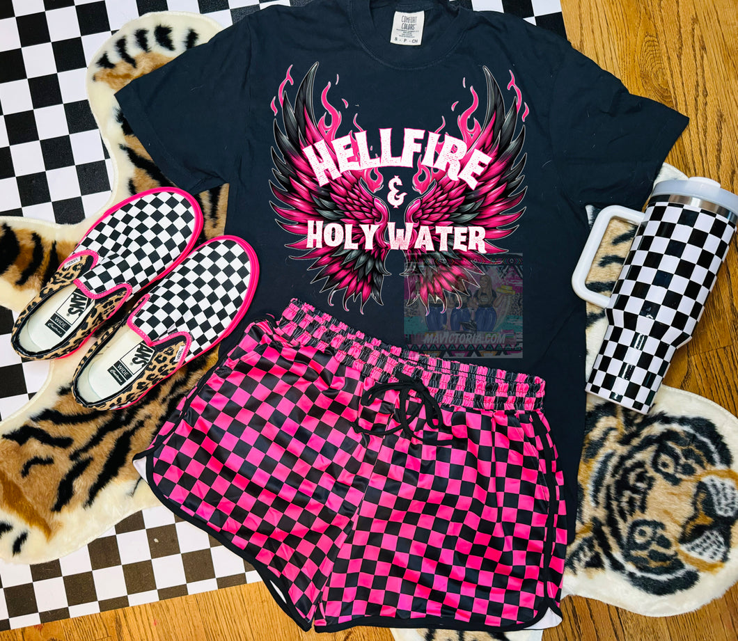 Hellfire and holy water comfort colors graphic tee paired with Checkered Sterling Kreek Patched Up Shorts - Mavictoria Designs Hot Press Express