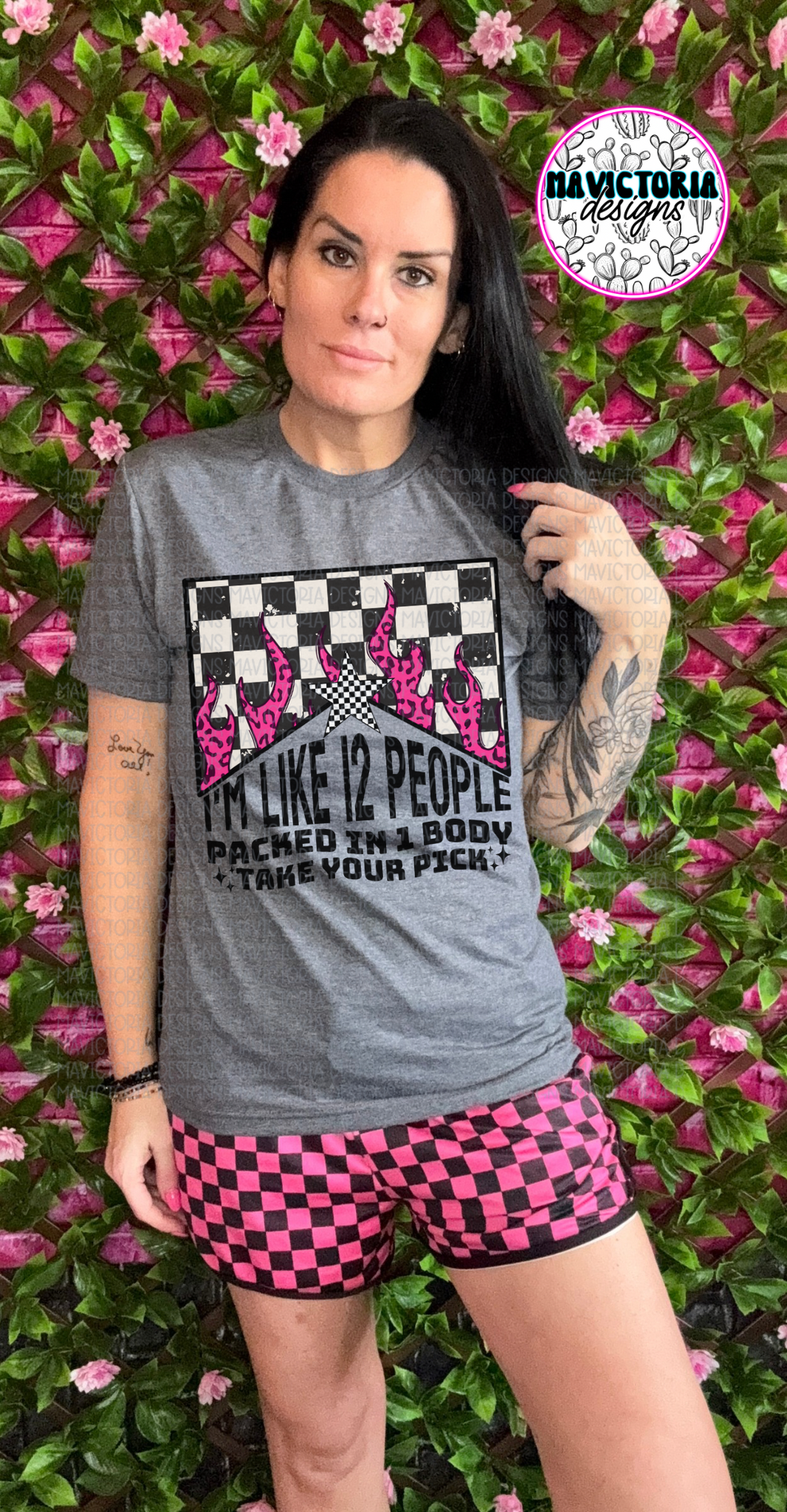 I’m like 12 people packed in one body take your pick FUNNY graphic tee with checkered hot pink and black checkered shorts available separately