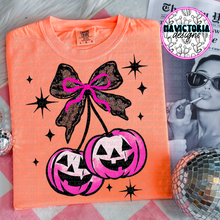 Load image into Gallery viewer, Neon pink coquette jack o lantern pumpkin cherries comfort colors graphic tee (you pick color) - Mavictoria Designs Hot Press Express
