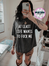 Load image into Gallery viewer, At least life wants to fuck me on black hoodie , crewneck, long sleeve or tee - Mavictoria Designs Hot Press Express
