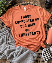 Load image into Gallery viewer, Proud supporter of dog hair and sweatpants. Funny dog mom graphic tee. Coral sunset. - Mavictoria Designs Hot Press Express
