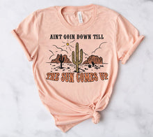 Load image into Gallery viewer, Aint goin down til the sun goes up western graphic tee, long sleeve, crew, or hoodie - Mavictoria Designs Hot Press Express
