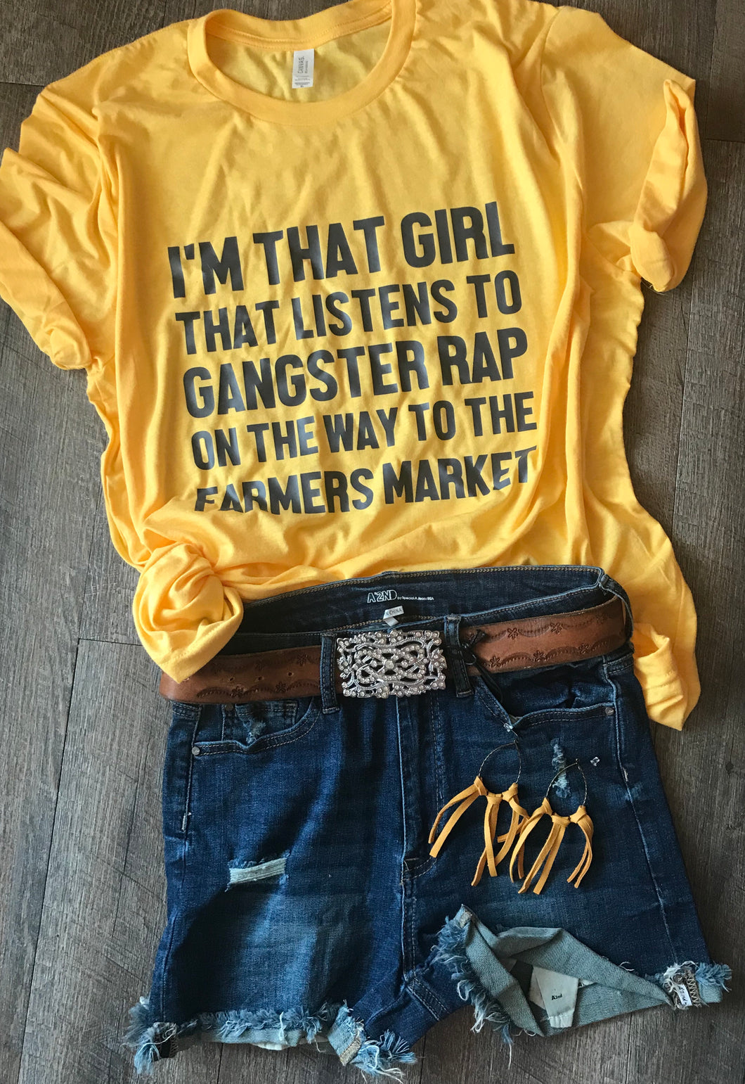 I’m that girl that listens to gangster rap on the way to the farmer’s market funny graphic tee on mustard - Mavictoria Designs Hot Press Express