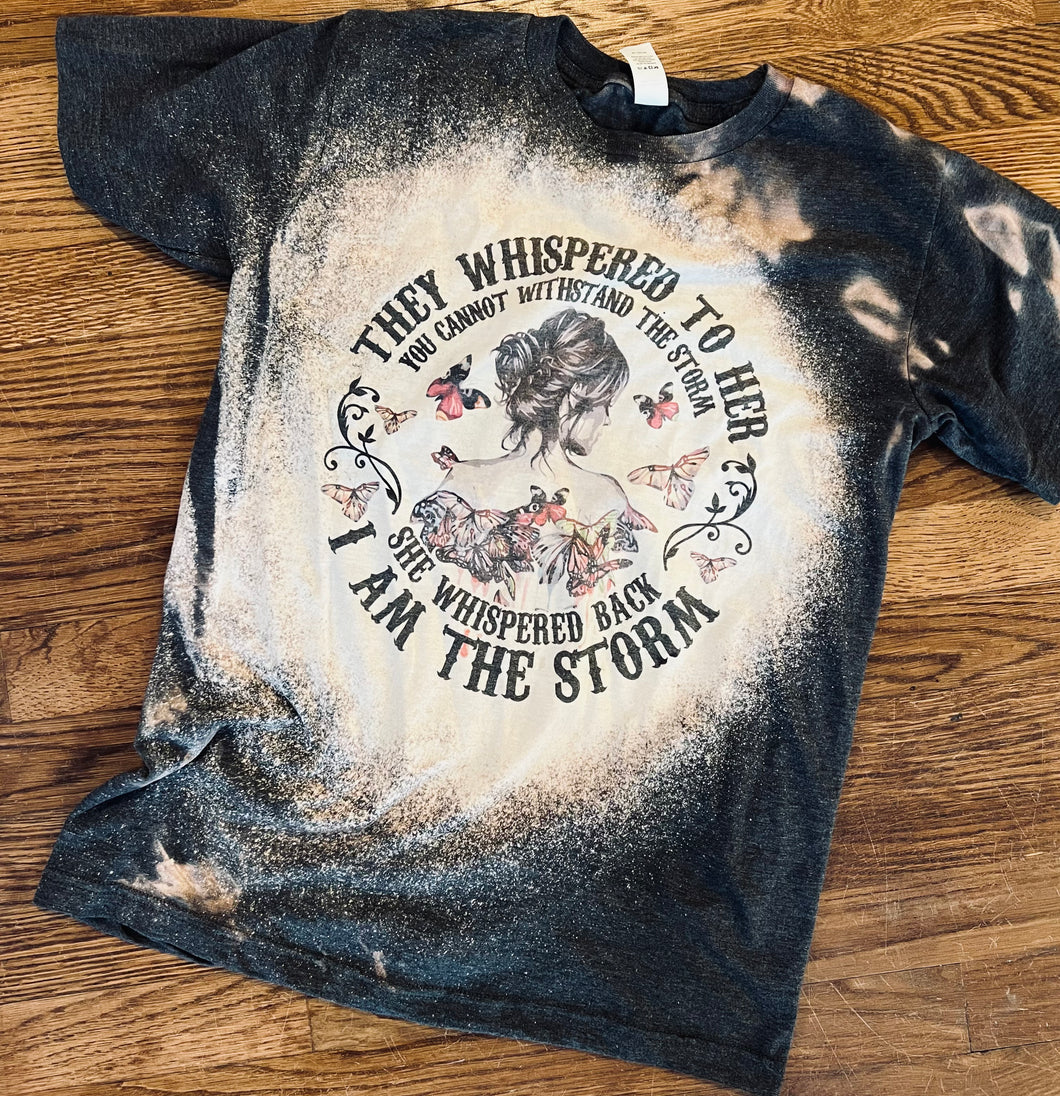They whispered to her you cannot withstand the storm she whispered back I am the storm bleached graphic tee - Mavictoria Designs Hot Press Express