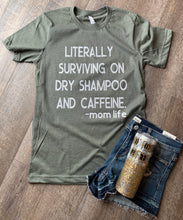 Load image into Gallery viewer, Literally surviving on dry shampoo and caffeine mom life. graphic tee heathered military green - Mavictoria Designs Hot Press Express
